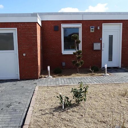Ferienhaus Plattfisch Dornum Bagian luar foto