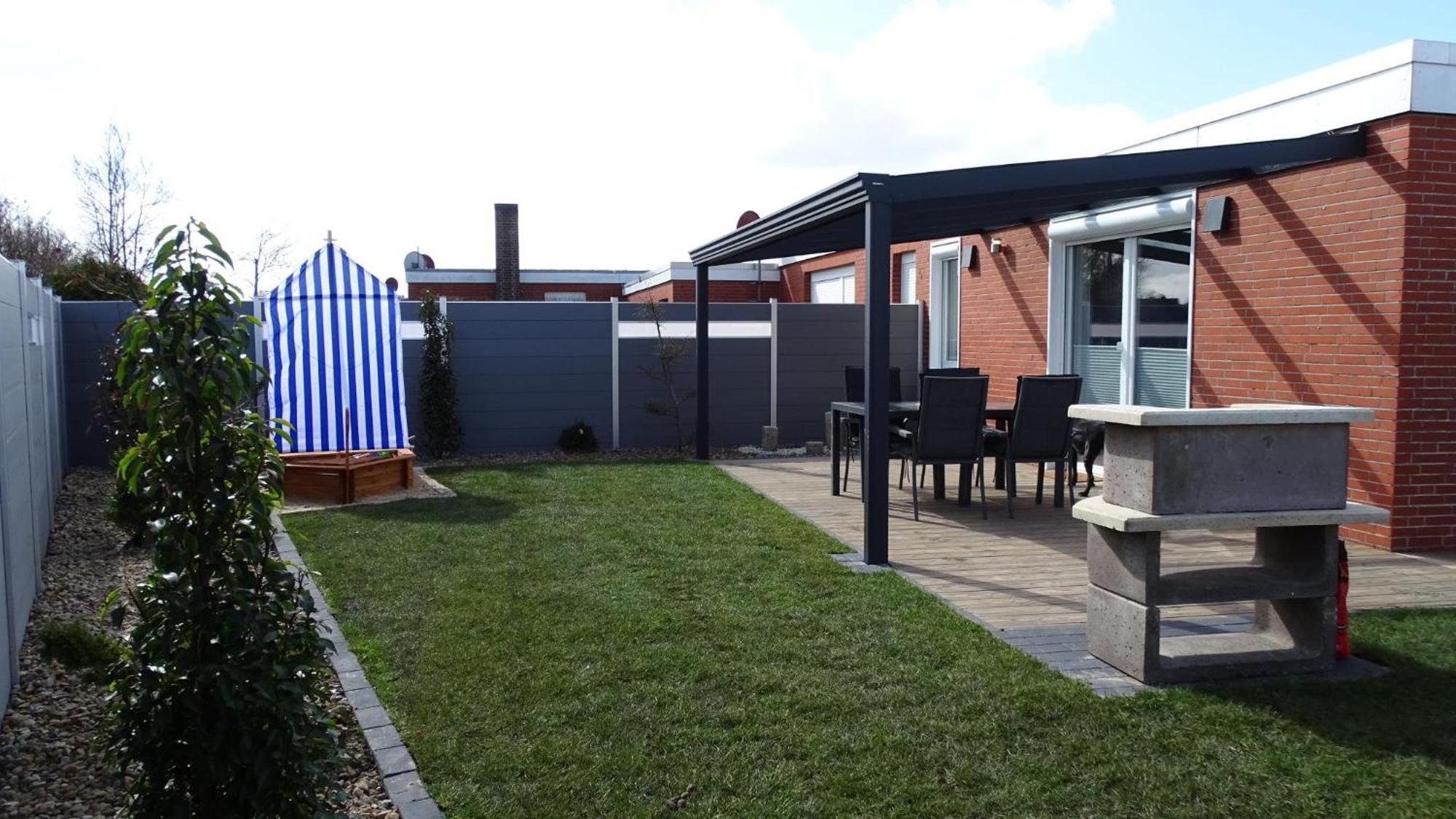 Ferienhaus Plattfisch Dornum Bagian luar foto